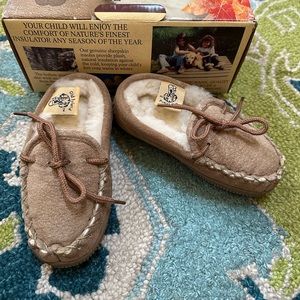 Old Friend brand genuine sheepskin slippers. Brand new in box. Size 9